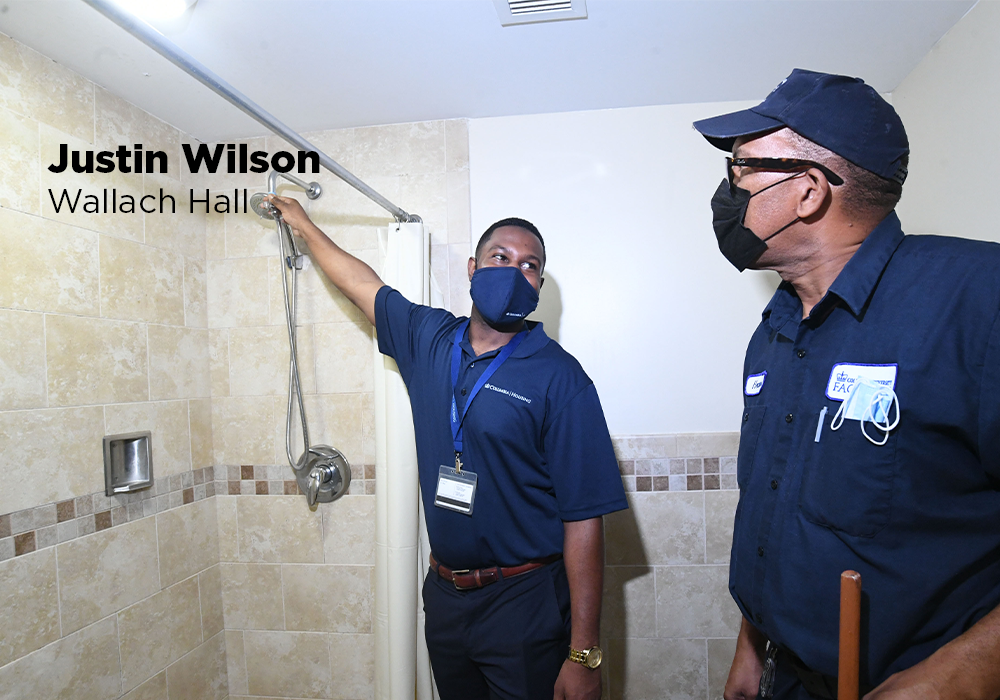 Justin Wilson consults with a staff member from the custodial team to review cleaning protocols in the buildings. In addition to managing building capacities, Housing worked closely with Facilities and Operations custodial teams to follow other health protocols, like ensuring spaces were cleaned and well-kept. 