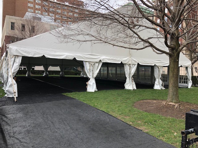 A large, white, outdoor tent on Furnald Lawn.