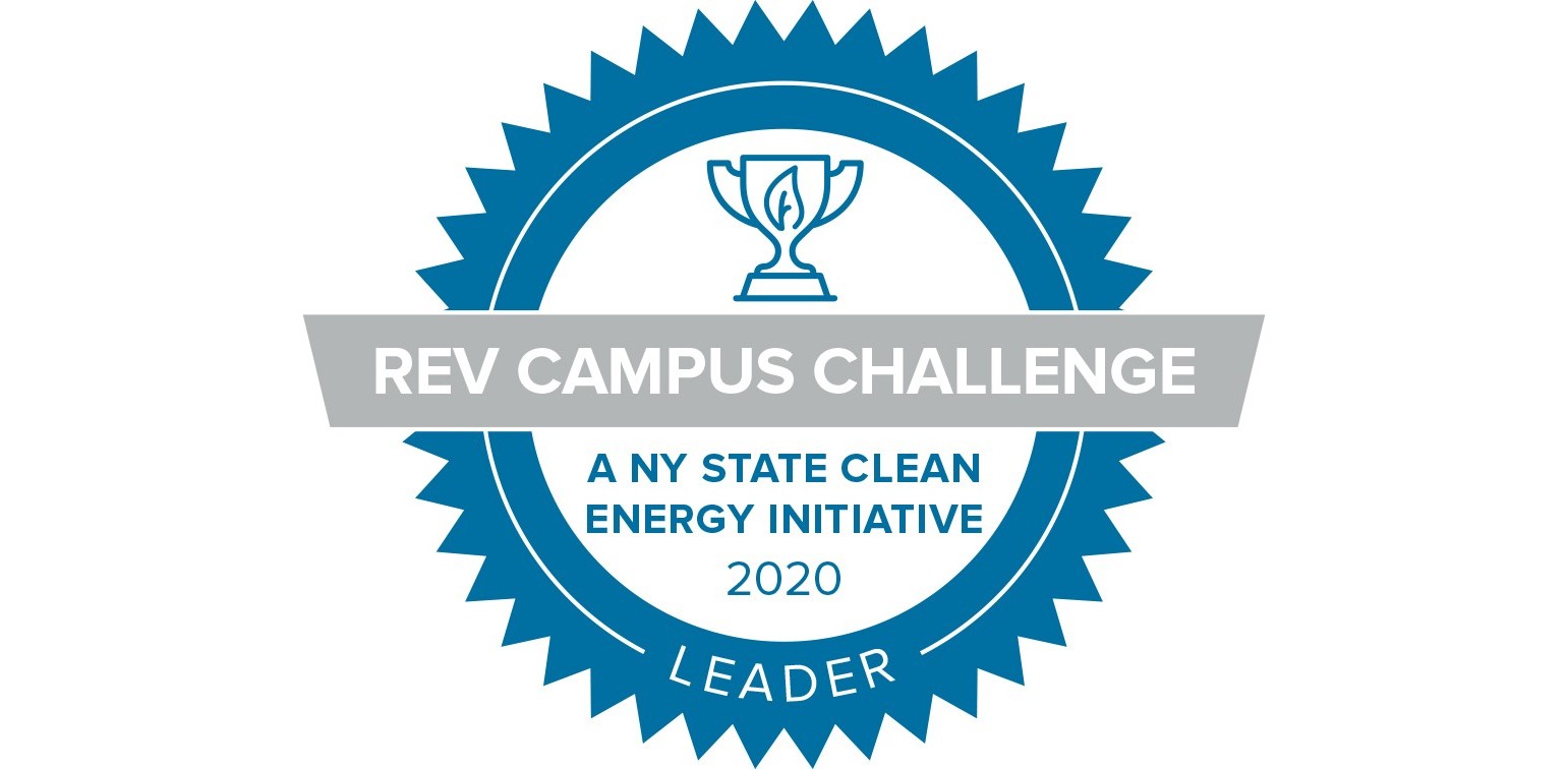 A blue seal that has a trophy inside that says REV Campus Challenge - A NY State Clean Energy Initiative 2020
